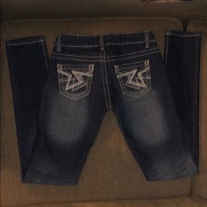 VIP Jeans w/distressed look & detailed pockets